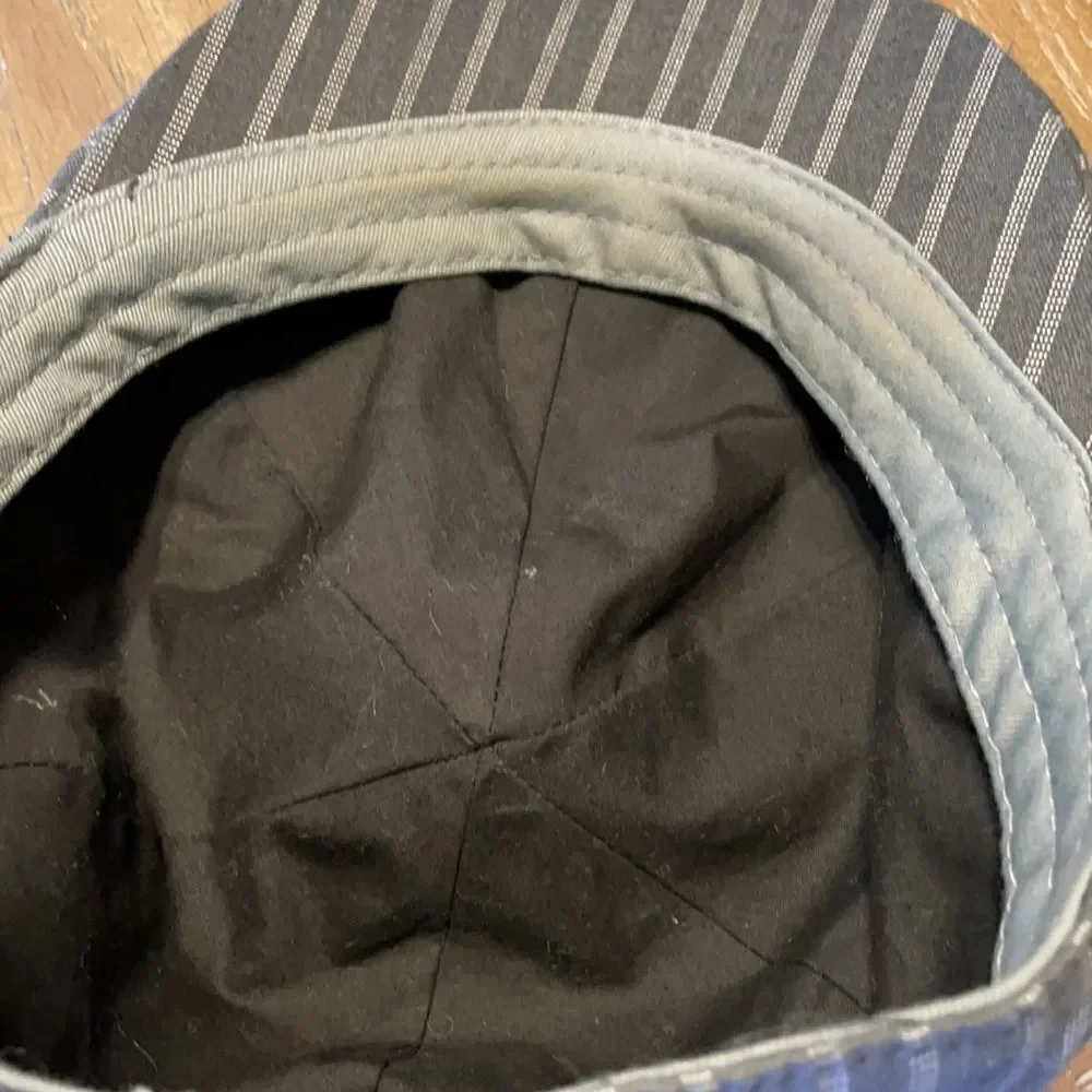 Dark and Light Gray Striped Newsboy Hat with Skull and Wings